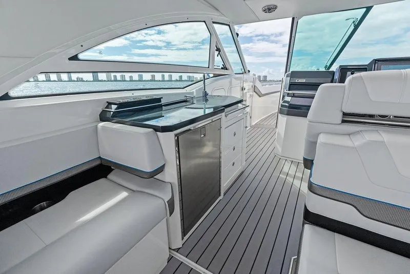 Slide: The Image of 2023 Formula 430 Super Sport Crossover interior with sleek seating and modern amenities. - 46
