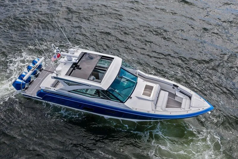 Slide: The Image of 2023 Formula 430 Super Sport Crossover cruising on water, showcasing sleek design and luxury features. - 5