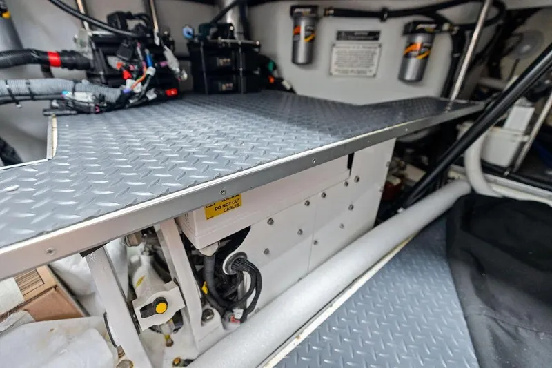 Slide: The Image of Engine compartment of 2023 Formula 430 Super Sport Crossover with detailed wiring and components. - 51