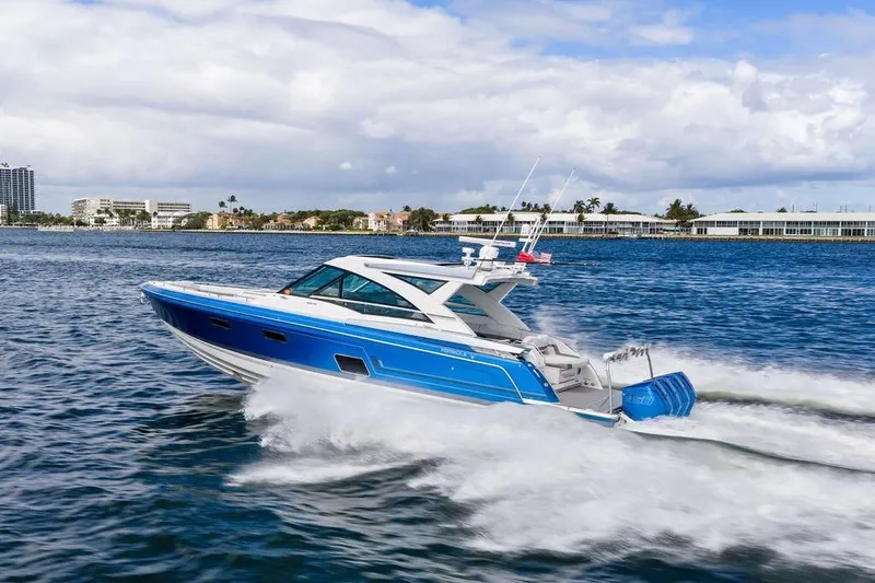 Slide: The Image of 2023 Formula 430 Super Sport Crossover cruising on a sunny day. - 8