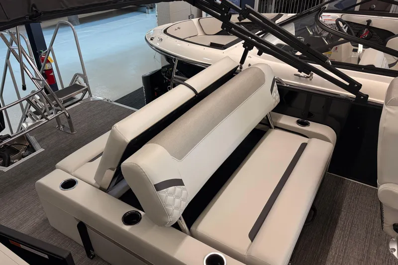 Slide: The Image of 2026 Crest Conquest 250 SLSC boat interior with luxurious seating and modern design. - 8