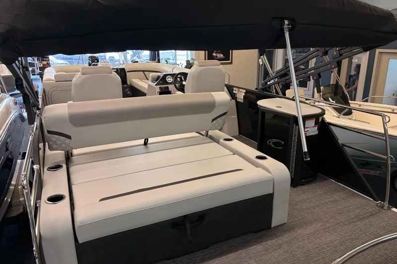 Slide: The Image of 2026 Crest Conquest 250 SLSC boat interior with luxurious seating and modern design. - 9