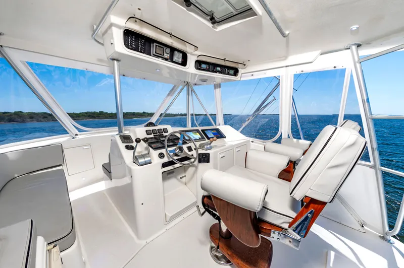 Slide: The Image of Interior of 2000 Ocean 48 SuperSport yacht with helm station. - 15