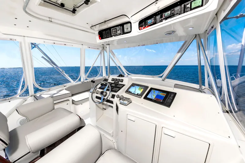 Slide: The Image of Interior of 2000 Ocean 48 SuperSport yacht with modern controls. - 16