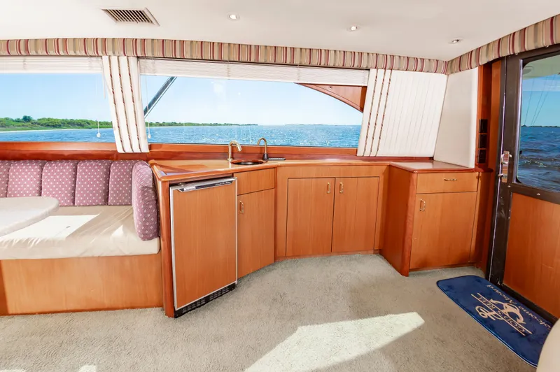 Slide: The Image of Interior of a 2000 Ocean 48 SuperSport yacht with ocean view. - 25