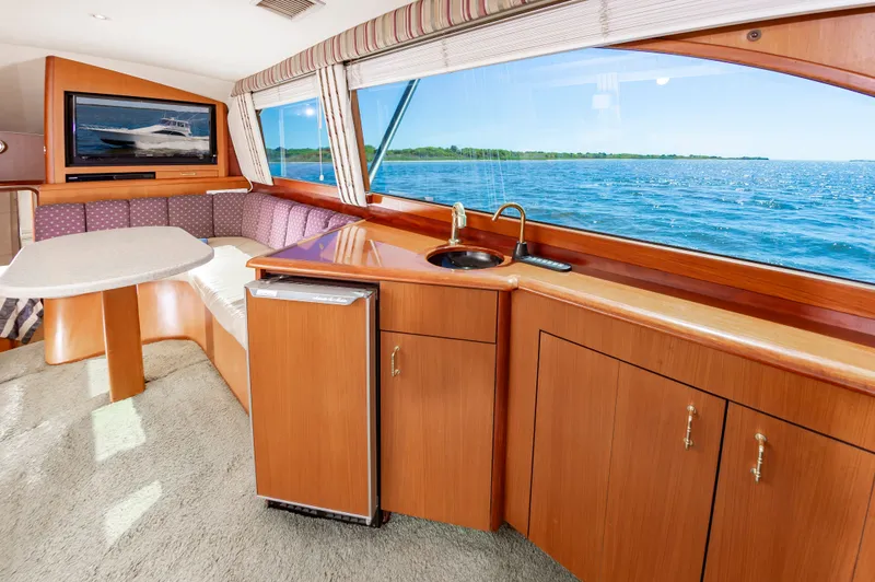 Slide: The Image of Interior of 2000 Ocean 48 SuperSport yacht with ocean view. - 27