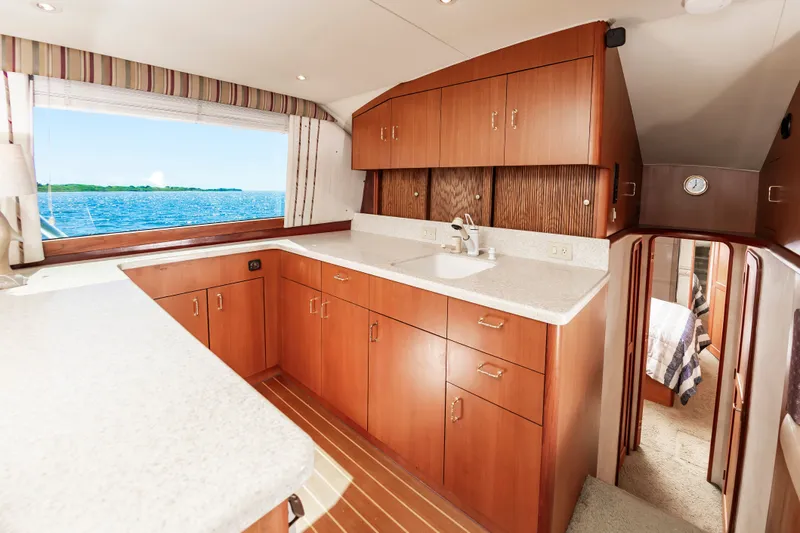 Slide: The Image of Interior of 2000 Ocean 48 SuperSport yacht with modern kitchen. - 31
