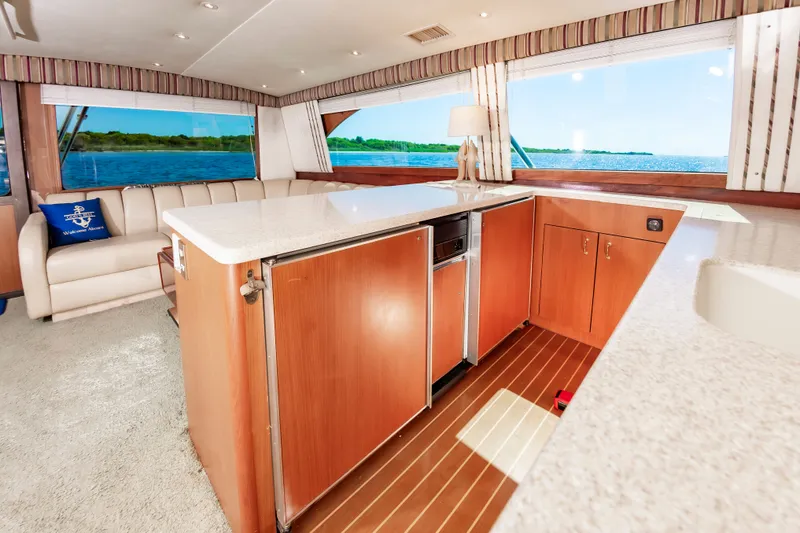 Slide: The Image of Interior of 2000 Ocean 48 SuperSport yacht featuring modern kitchen. - 32