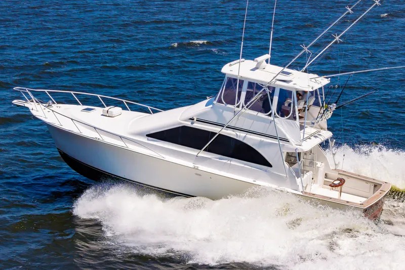Slide: The Image of Ocean 48 SuperSport 2000 yacht cruising on open sea. - 4