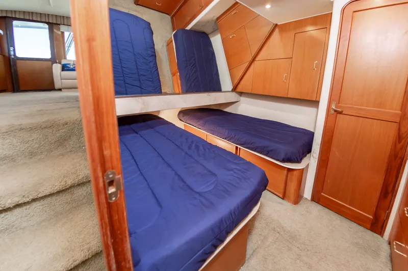 Slide: The Image of Interior of Ocean 48 SuperSport yacht with blue bedding, year 2000. - 40