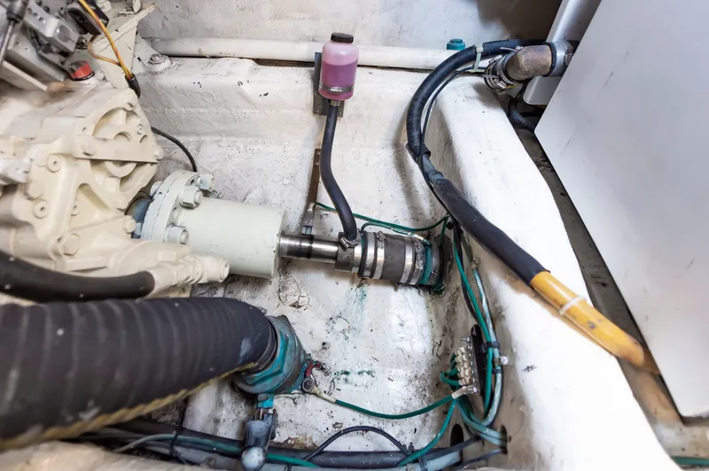 Slide: The Image of Engine room of Ocean 48 SuperSport 2000 with drive components. - 48