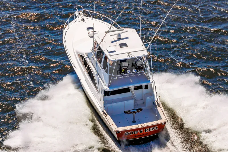 Slide: The Image of Ocean 48 SuperSport 2000 yacht cruising on the water. - 6