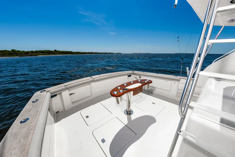 Slide: The Image of Ocean 48 SuperSport 2000 on open sea under sunny skies. - 8
