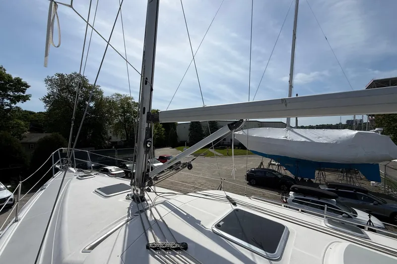 Slide: The Image of 2005 Hunter 41 Deck Salon sailboat deck view with mast and rigging. - 19
