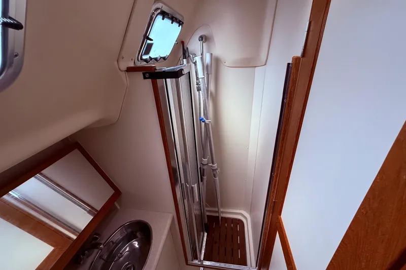 Slide: The Image of Bathroom interior of 2005 Hunter 41 Deck Salon yacht with shower and sink. - 40