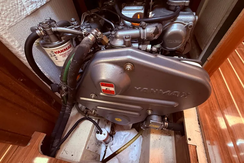 Slide: The Image of Engine compartment of 2005 Hunter 41 Deck Salon with Yanmar components. - 62