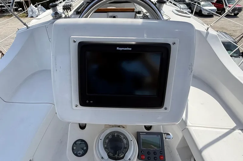 Slide: The Image of Cockpit of 2005 Hunter 41 Deck Salon with Raymarine navigation equipment. - 9
