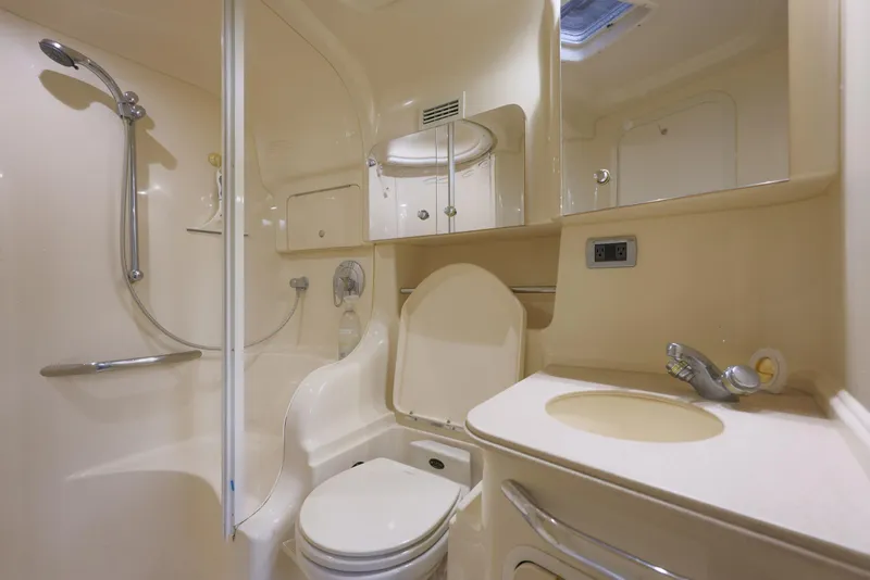 Slide: The Image of Luxurious bathroom in a 2002 Sea Ray 410 Express Cruiser yacht. - 14