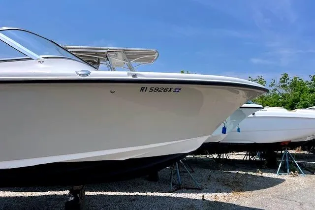 Slide: The Image of 2020 Key West 239 DFS boat on display under clear blue sky. - 3