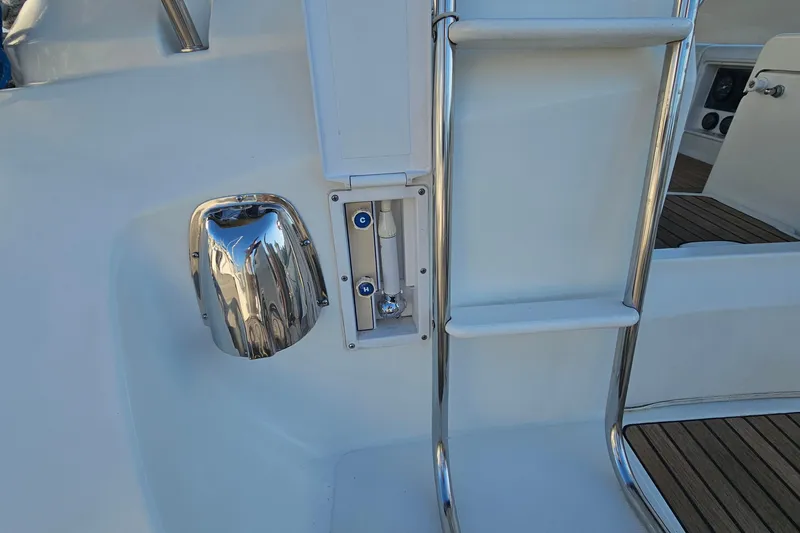 Slide: The Image of Stainless steel ladder and controls on 2002 Jeanneau Sun Odyssey 37 yacht deck. - 9