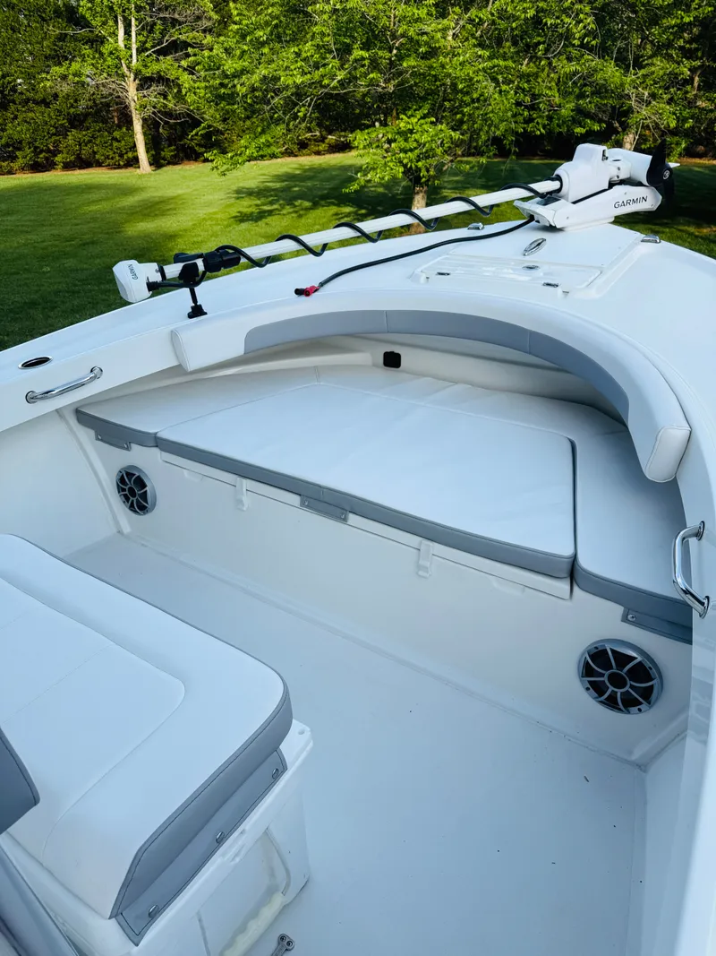 Slide: The Image of Interior of a Parker 21 boat, 2024 model, featuring seating area. - 11