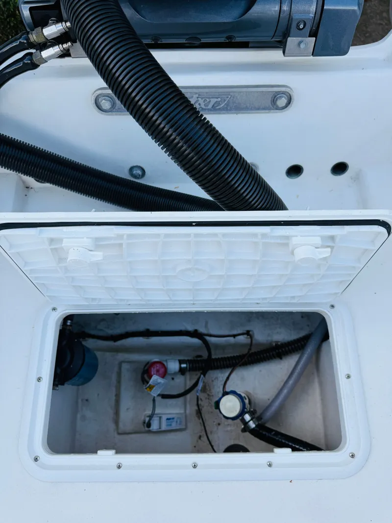 Slide: The Image of Open storage compartment in Parker 21 boat, 2024 model. - 12