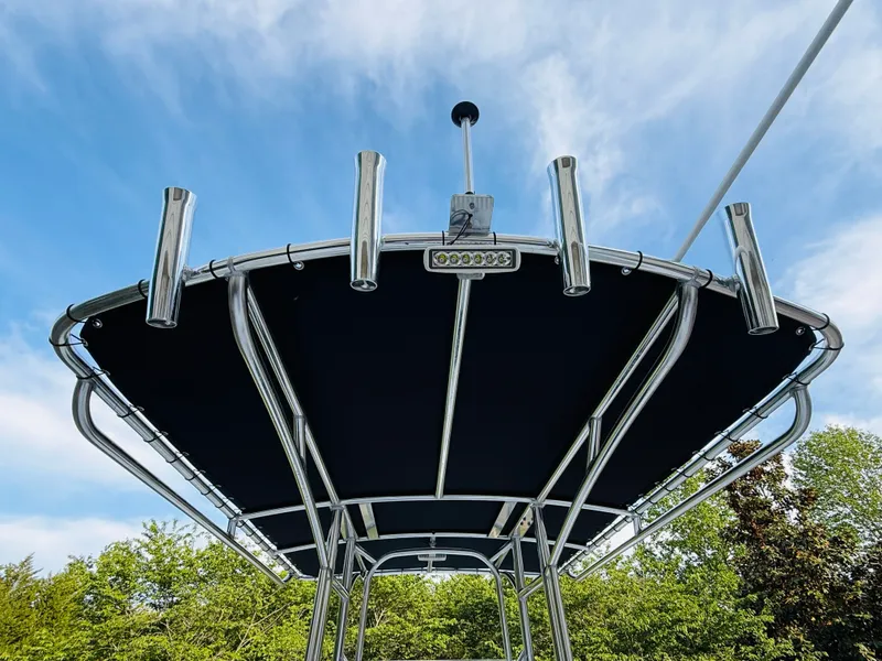 Slide: The Image of Parker 21 boat canopy with fishing rod holders, 2024 model. - 15