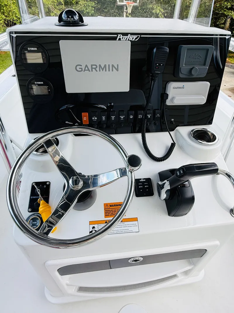 Slide: The Image of Control console of a Parker 21 boat with Garmin navigation, year 2024. - 22