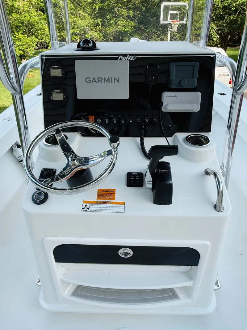 Slide: The Image of Parker 21 boat console with Garmin navigation system. - 23