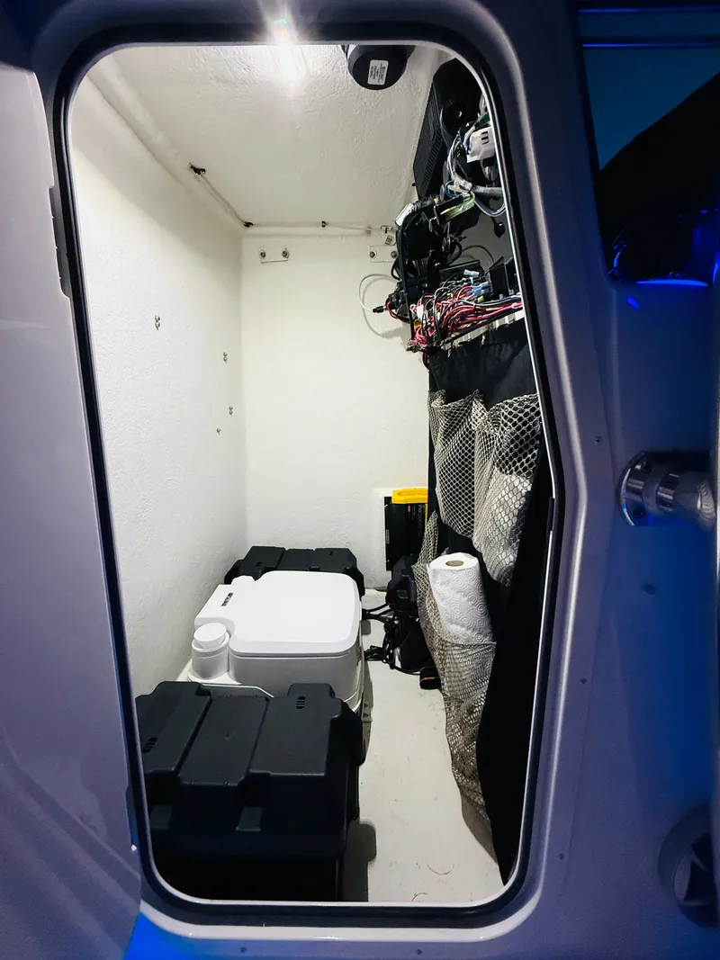 Slide: The Image of Interior of a Parker 21 boat with toilet and equipment, 2024 model. - 30