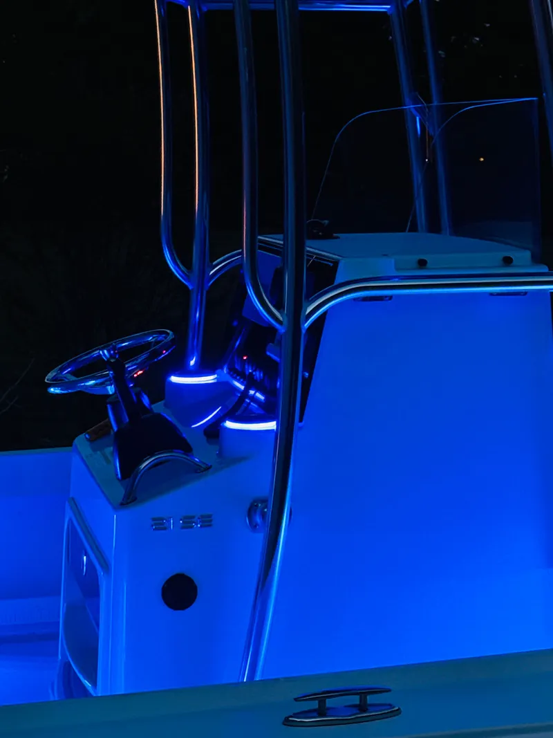 Slide: The Image of Illuminated cockpit of a Parker 21 boat, 2024 model, at night. - 31
