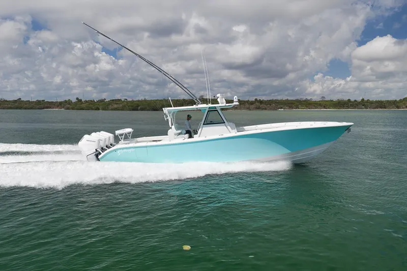 Slide: The Image of 2017 Yellowfin 39 Offshore boat cruising on a sunny day with clear skies. - 1