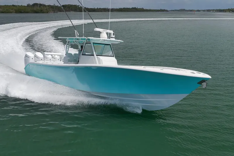 Slide: The Image of 2017 Yellowfin 39 Offshore boat cruising on open water, showcasing sleek design and performance. - 2