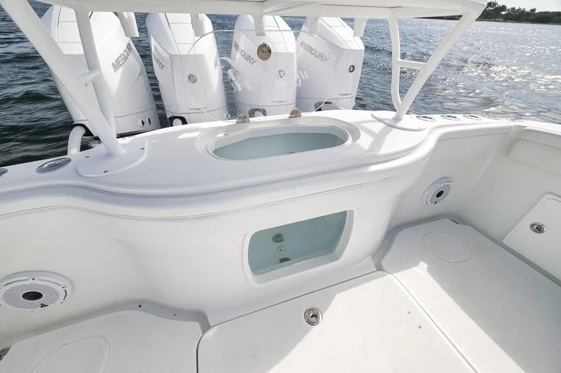 Slide: The Image of 2017 Yellowfin 39 Offshore boat with Mercury engines on calm water. - 20