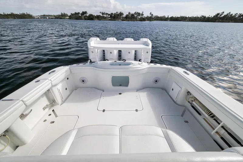 Slide: The Image of 2017 Yellowfin 39 Offshore boat deck with ocean view and triple engines. - 21