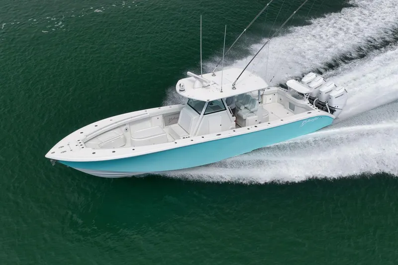 Slide: The Image of 2017 Yellowfin 39 Offshore boat speeding on open water. - 31
