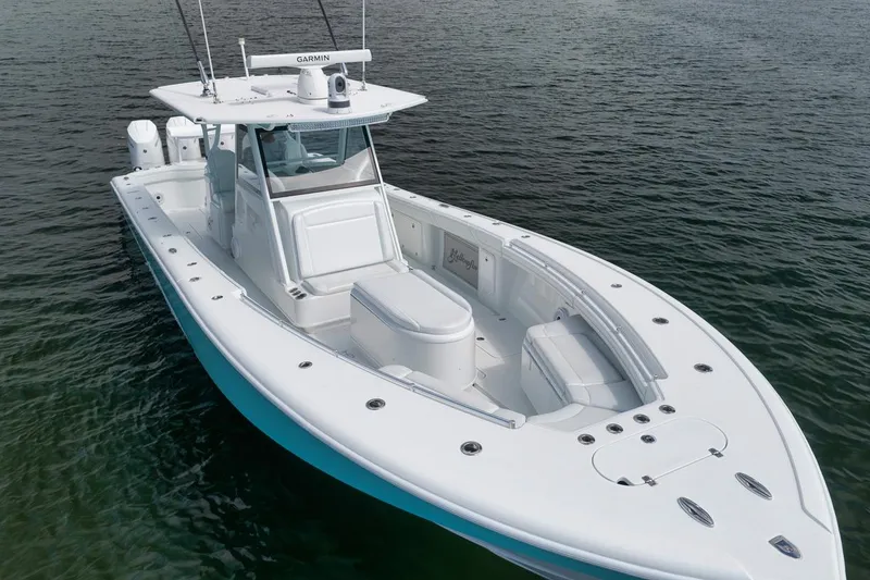 Slide: The Image of 2017 Yellowfin 39 Offshore boat on water, featuring sleek design and spacious deck. - 37