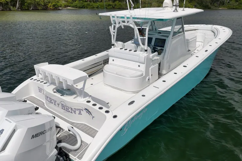Slide: The Image of 2017 Yellowfin 39 Offshore boat with Mercury engines on a calm waterway. - 4