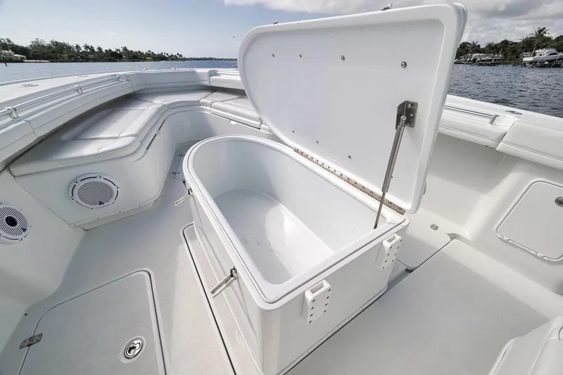Slide: The Image of Open storage compartment on 2017 Yellowfin 39 Offshore boat, showcasing spacious interior. - 8