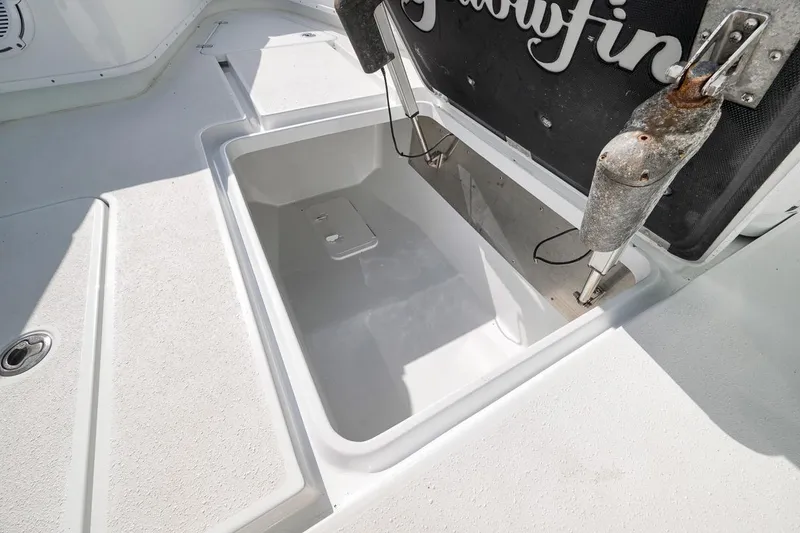 Slide: The Image of Open storage compartment on a 2017 Yellowfin 39 Offshore boat deck. - 9