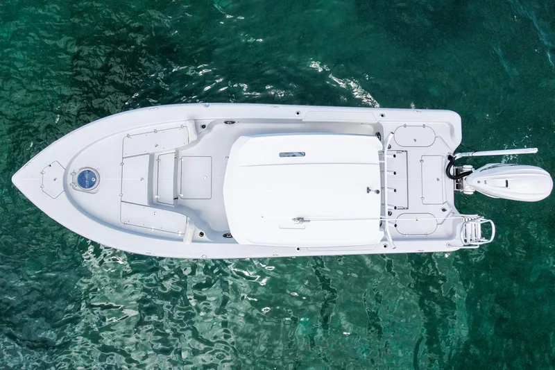 Slide: The Image of Overhead view of 2019 Blue Wave 2800 Pure Hybrid boat on clear water. - 2