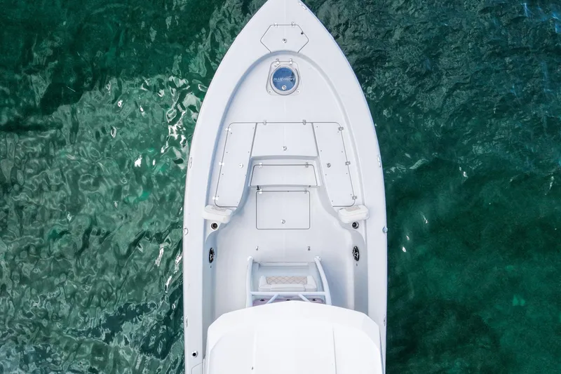 Slide: The Image of Overhead view of 2019 Blue Wave 2800 Pure Hybrid boat on clear water. - 6