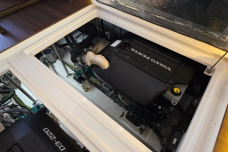 Slide: The Image of Engine compartment of 2023 Greenline 40 with Volvo Penta engine, showcasing modern marine technology. - 44