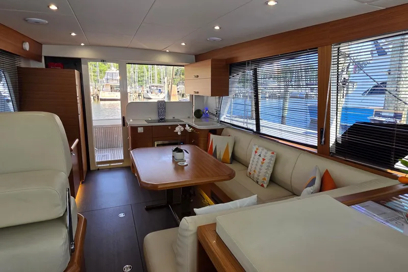 Slide: The Image of Luxurious interior of 2023 Greenline 40 yacht with modern furnishings and large windows. - 25
