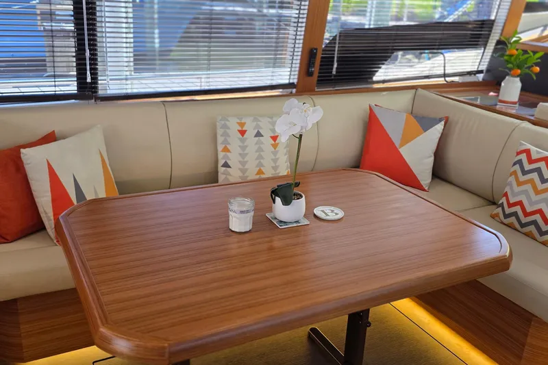 Slide: The Image of Luxurious interior of 2023 Greenline 40 yacht with modern decor and wooden table. - 23