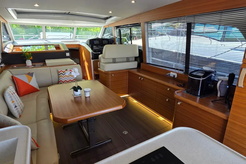 Slide: The Image of Luxurious interior of 2023 Greenline 40 yacht with modern furnishings and natural light. - 17