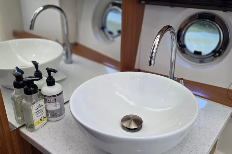 Slide: The Image of Modern bathroom sink with chrome faucet on Greenline 40 yacht, 2023 model. - 41
