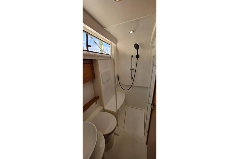 Slide: The Image of Modern bathroom interior of 2023 Greenline 40 yacht with shower and toilet. - 39