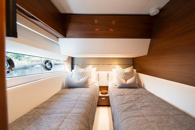 Slide: The Image of Luxurious twin cabin interior of 2023 Princess S66 Sportbridge yacht. - 24