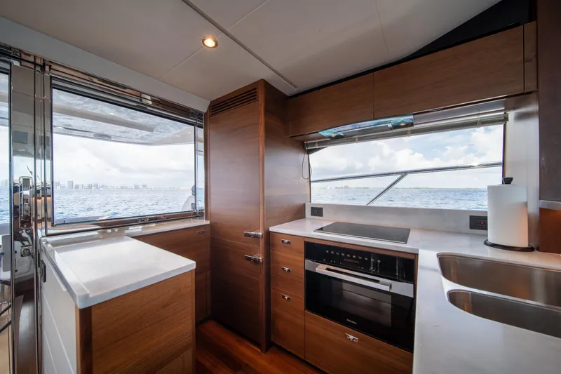 Slide: The Image of Luxurious kitchen interior of 2023 Princess S66 Sportbridge yacht with ocean view. - 10